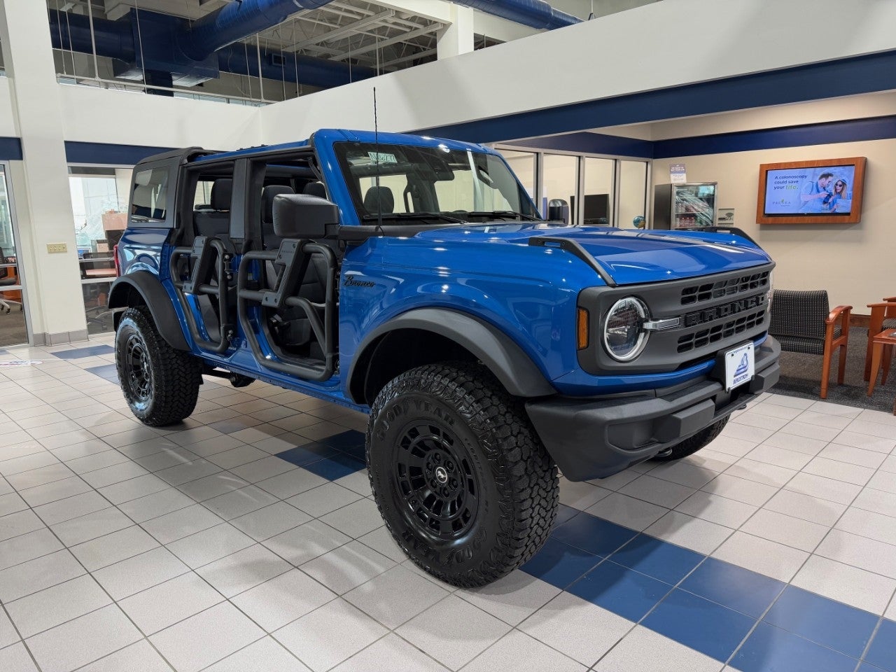 2026 Ford Bronco 4 DOOR 4X4 FORD CUSTOM GARAGE in Velocity Blue Metallic — front three-quarter view