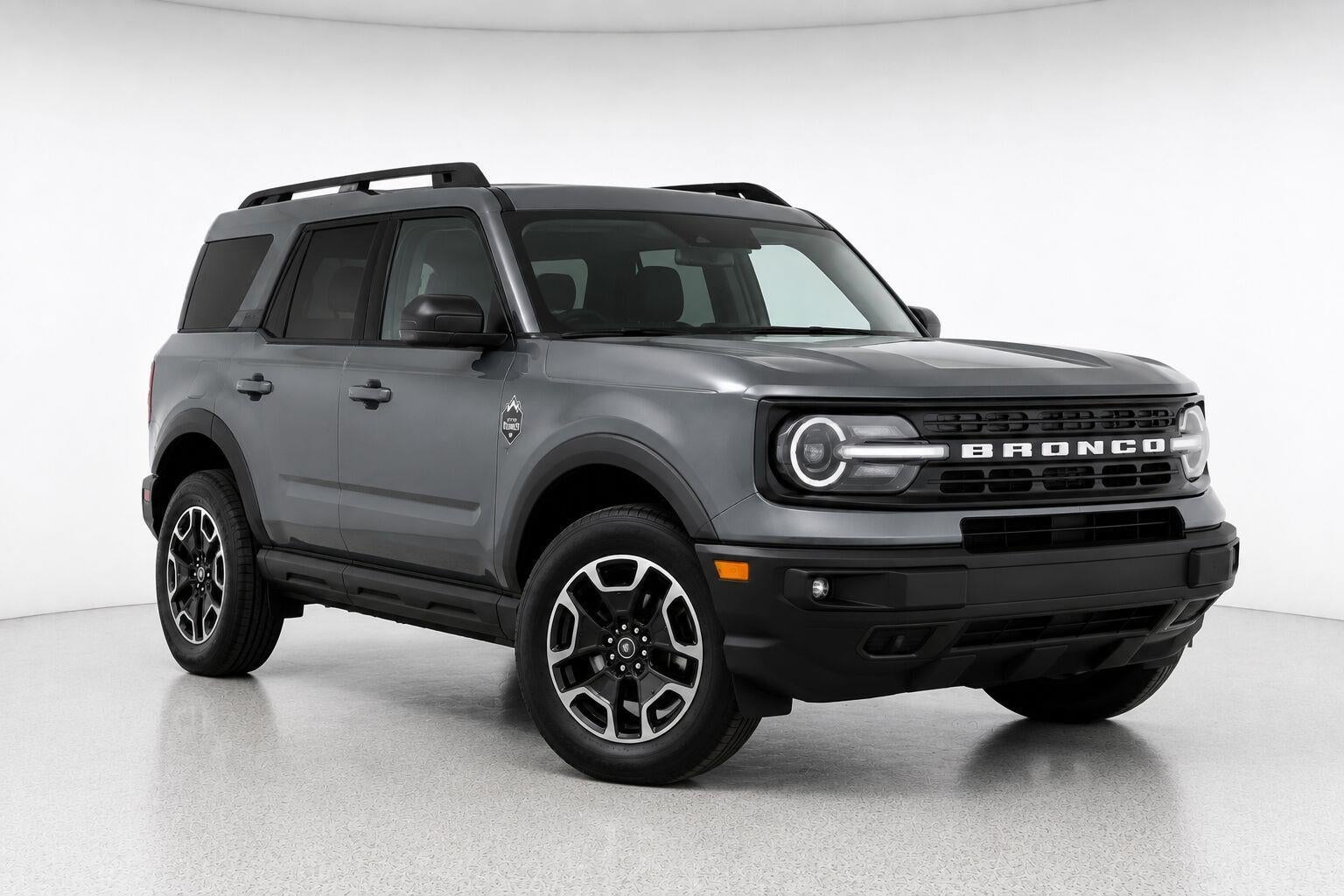 2026 Ford Bronco Outer Banks 4 Door 4x4 in Desert Sand — front three-quarter view