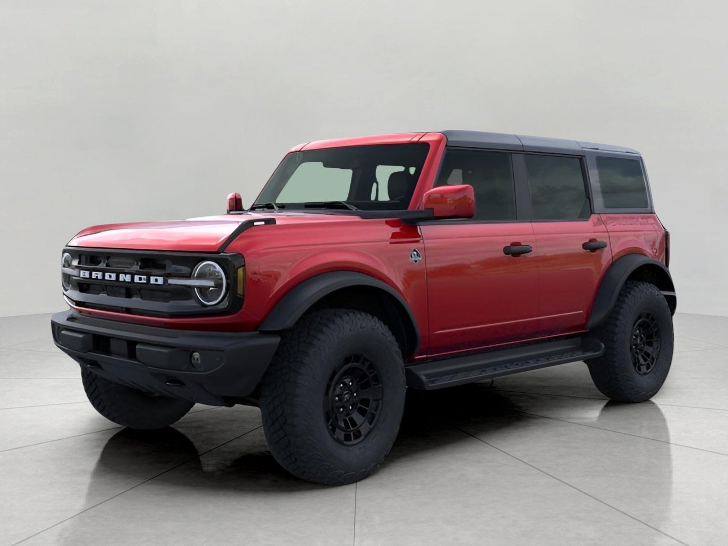 2026 Ford Bronco Outer Banks 4 Door 4x4 in Ruby Red Metallic Tinted Clearcoat — front three-quarter view