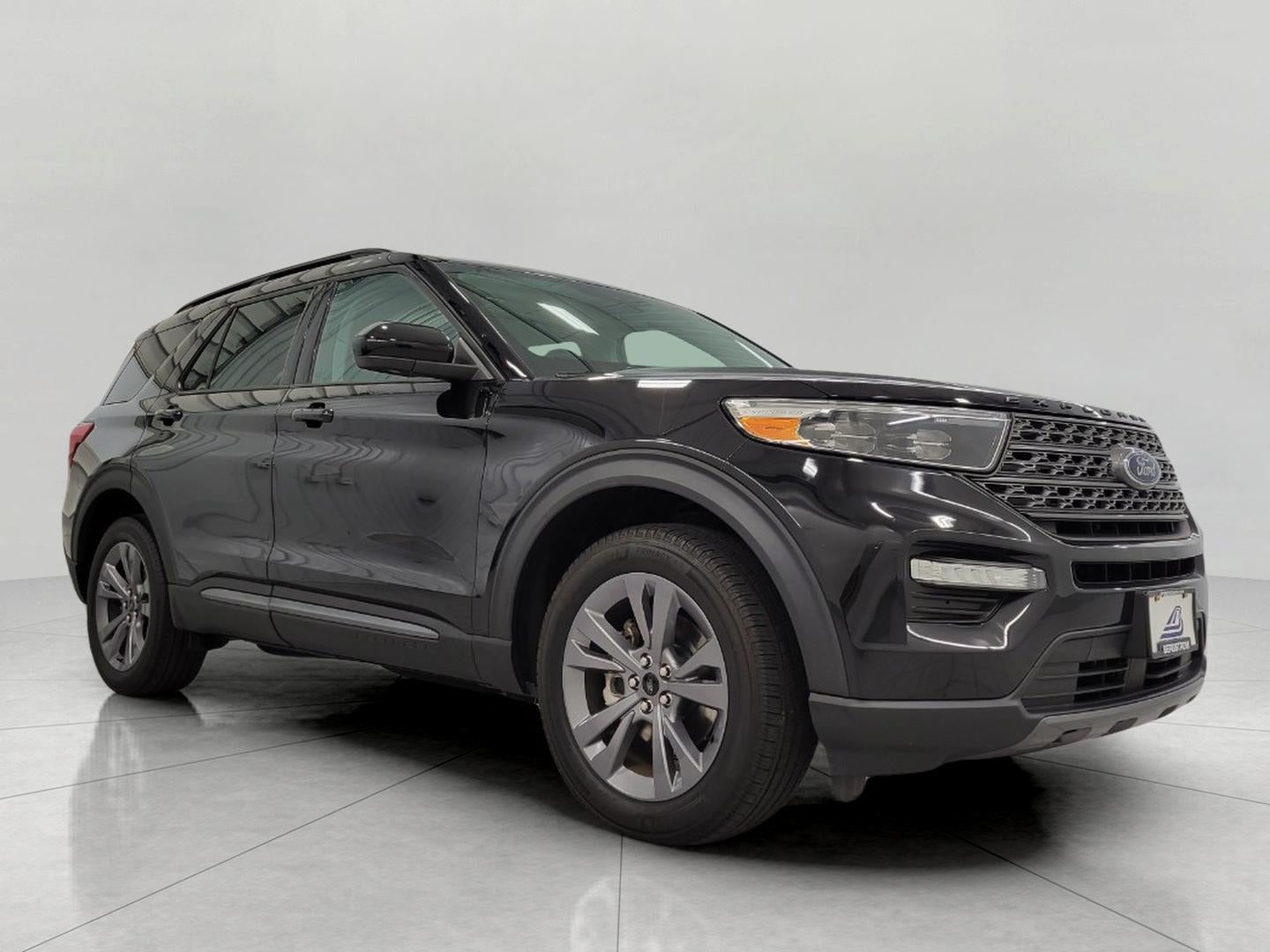 2023 Ford Explorer XLT 4WD in Agate Black Metallic — front three-quarter view