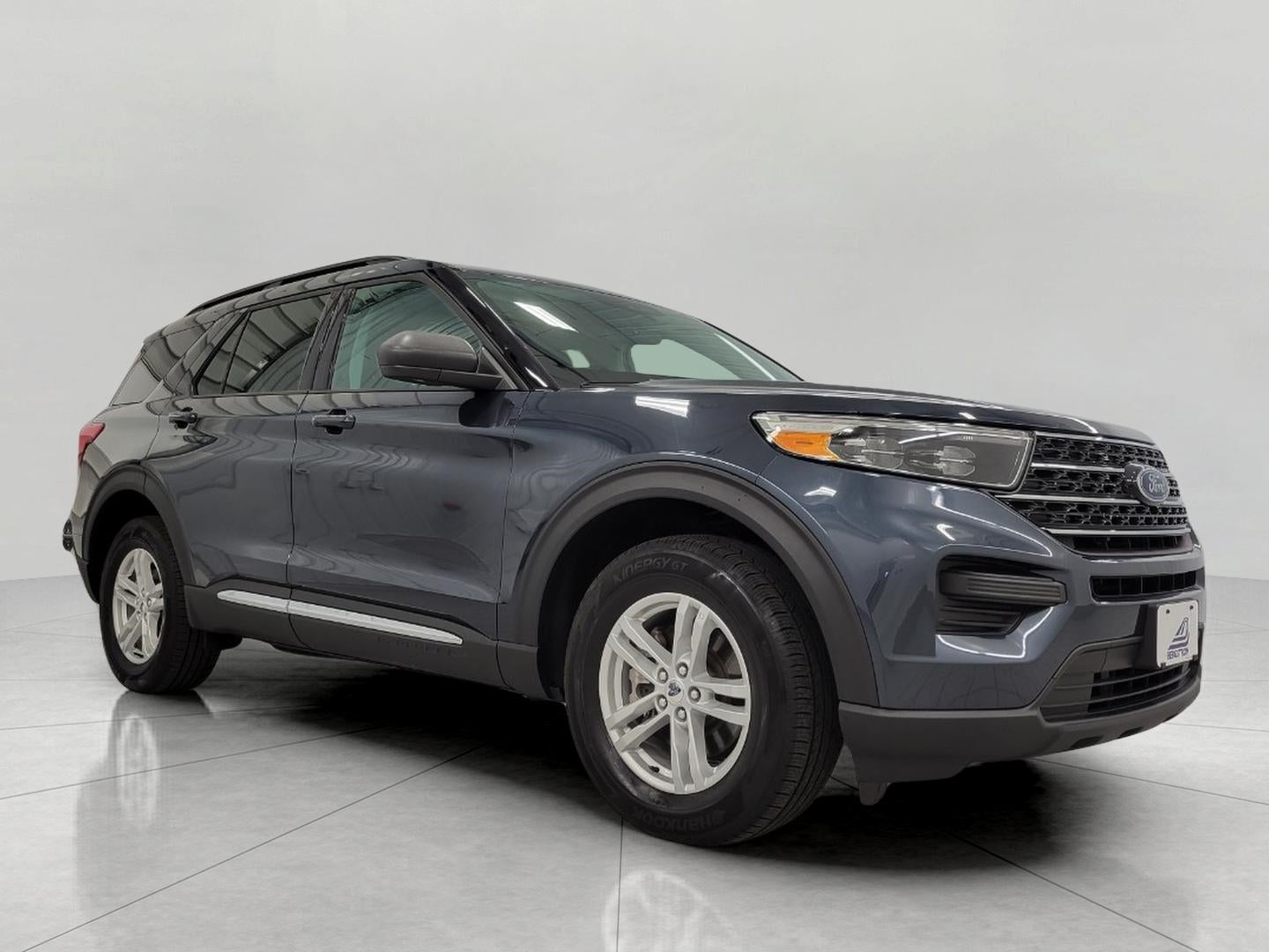 2024 Ford Explorer XLT 4WD in Stone Blue Metallic — front three-quarter view