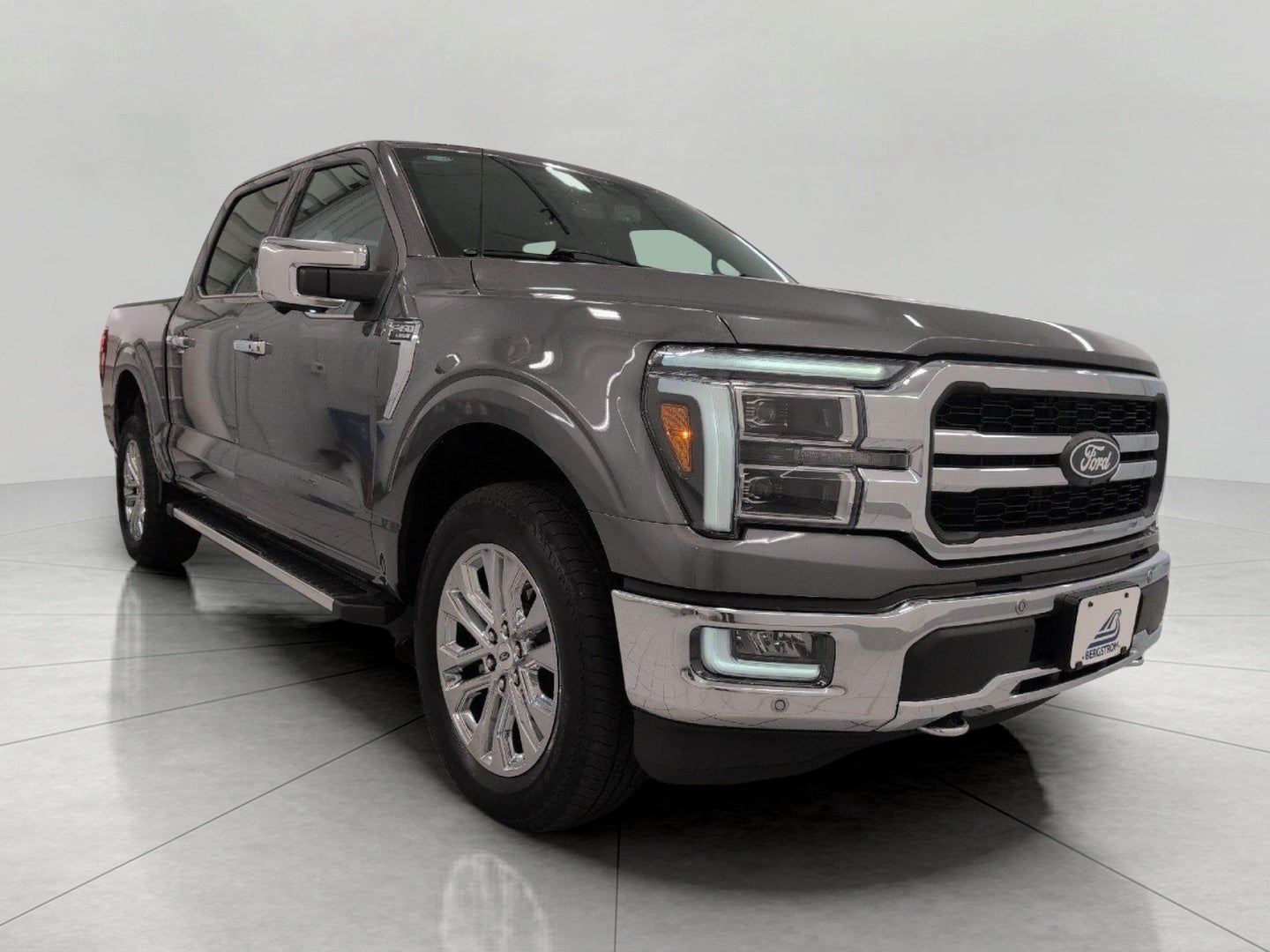2024 Ford F-150 LARIAT in Carbonized Gray Metallic — front three-quarter view