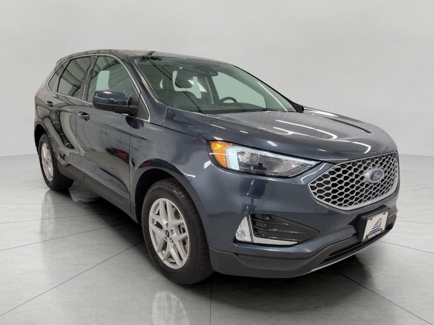2024 Ford Edge SEL AWD in Stone Blue Metallic — front three-quarter view