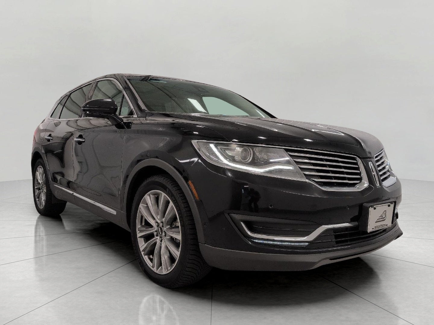 2017 Lincoln MKX Reserve AWD in Diamond Black — front three-quarter view
