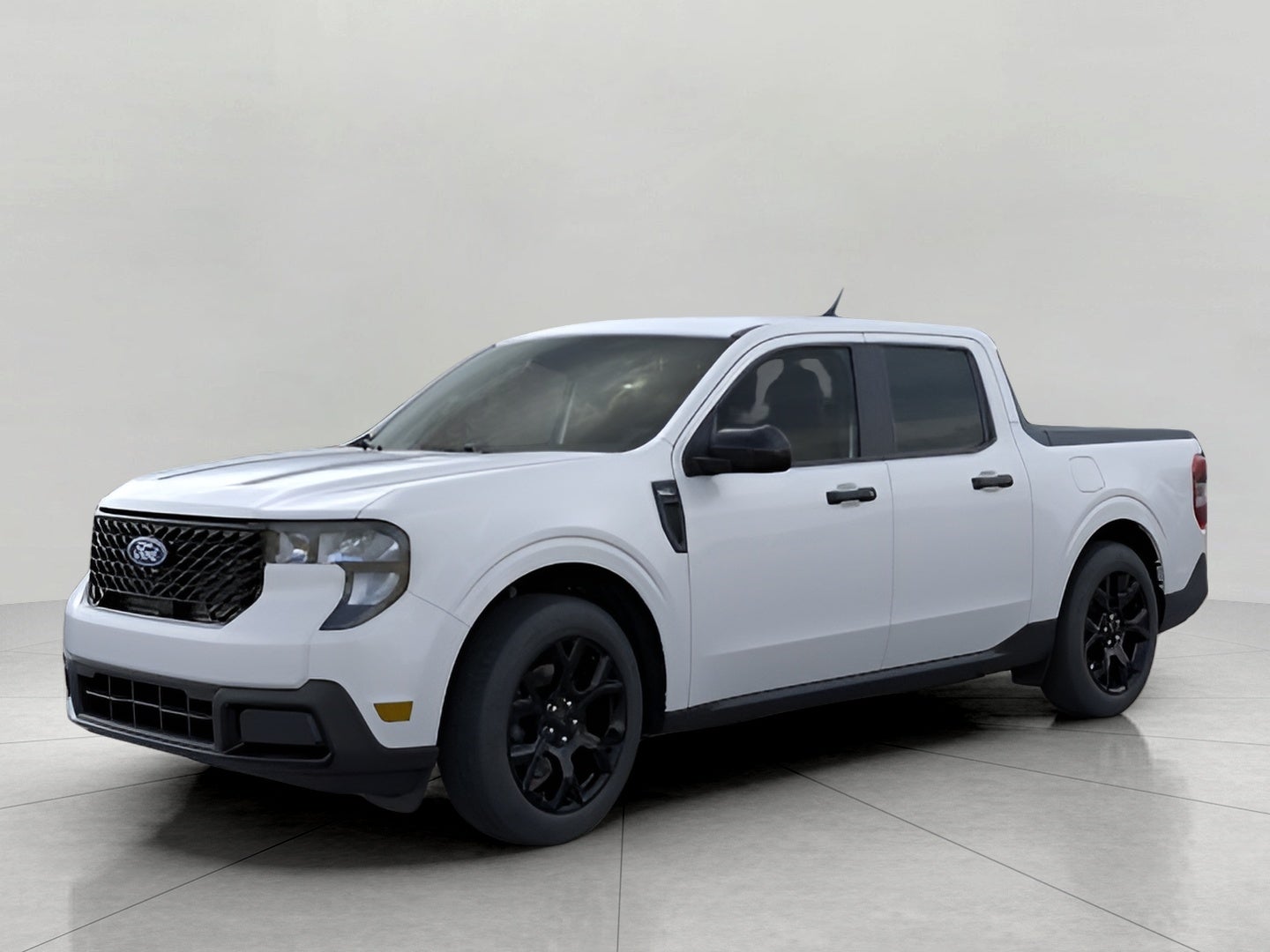 2026 Ford Maverick XLT AWD SuperCrew in White — front three-quarter view