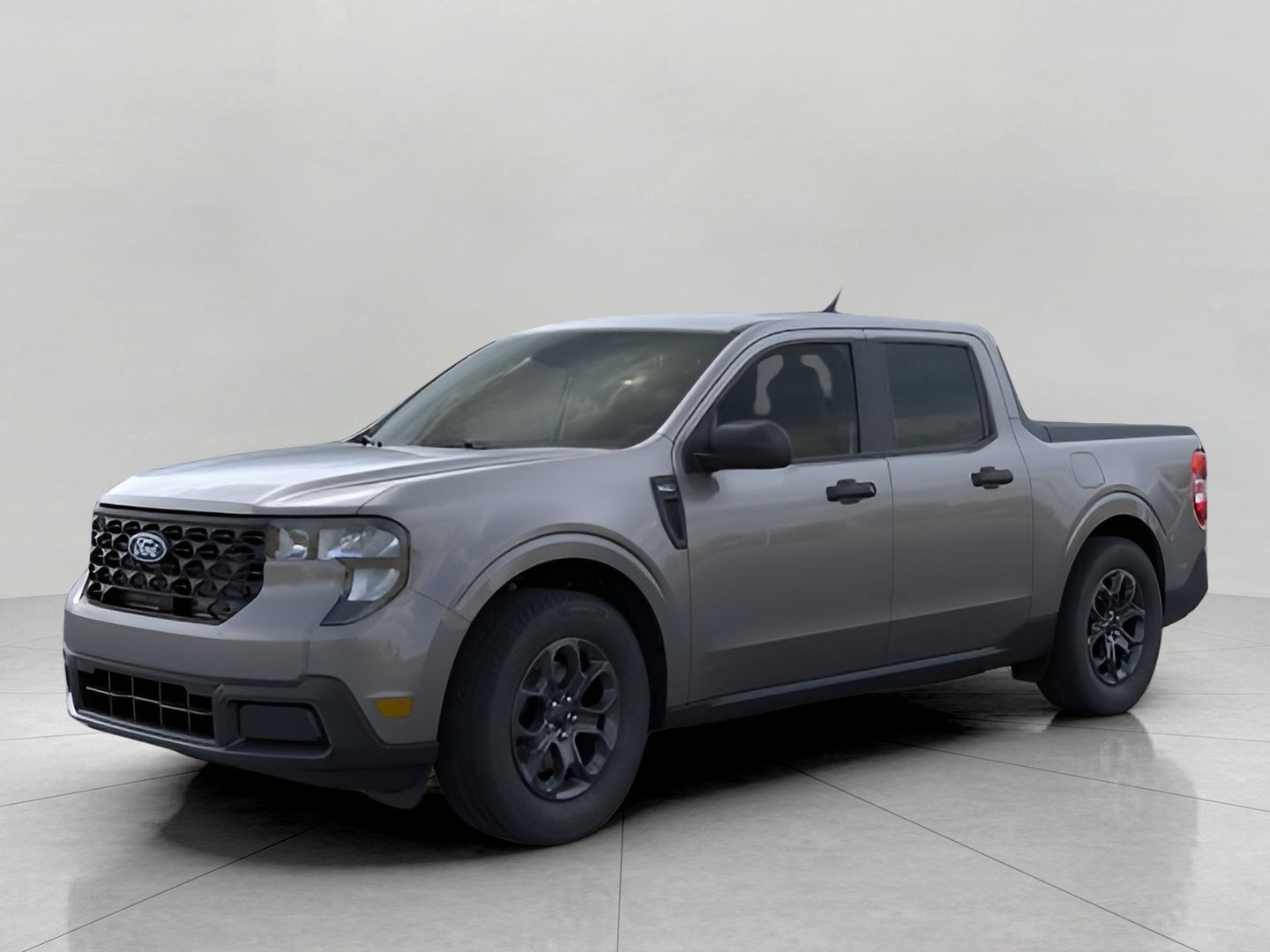 2026 Ford Maverick XLT AWD SuperCrew in Carbonized Gray Metallic — front three-quarter view