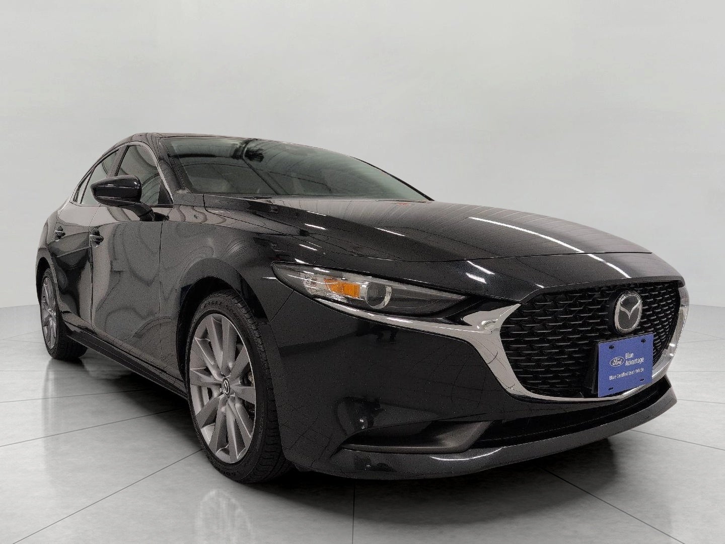2021 Mazda Mazda3 Sedan Select FWD in Jet Black Mica — front three-quarter view