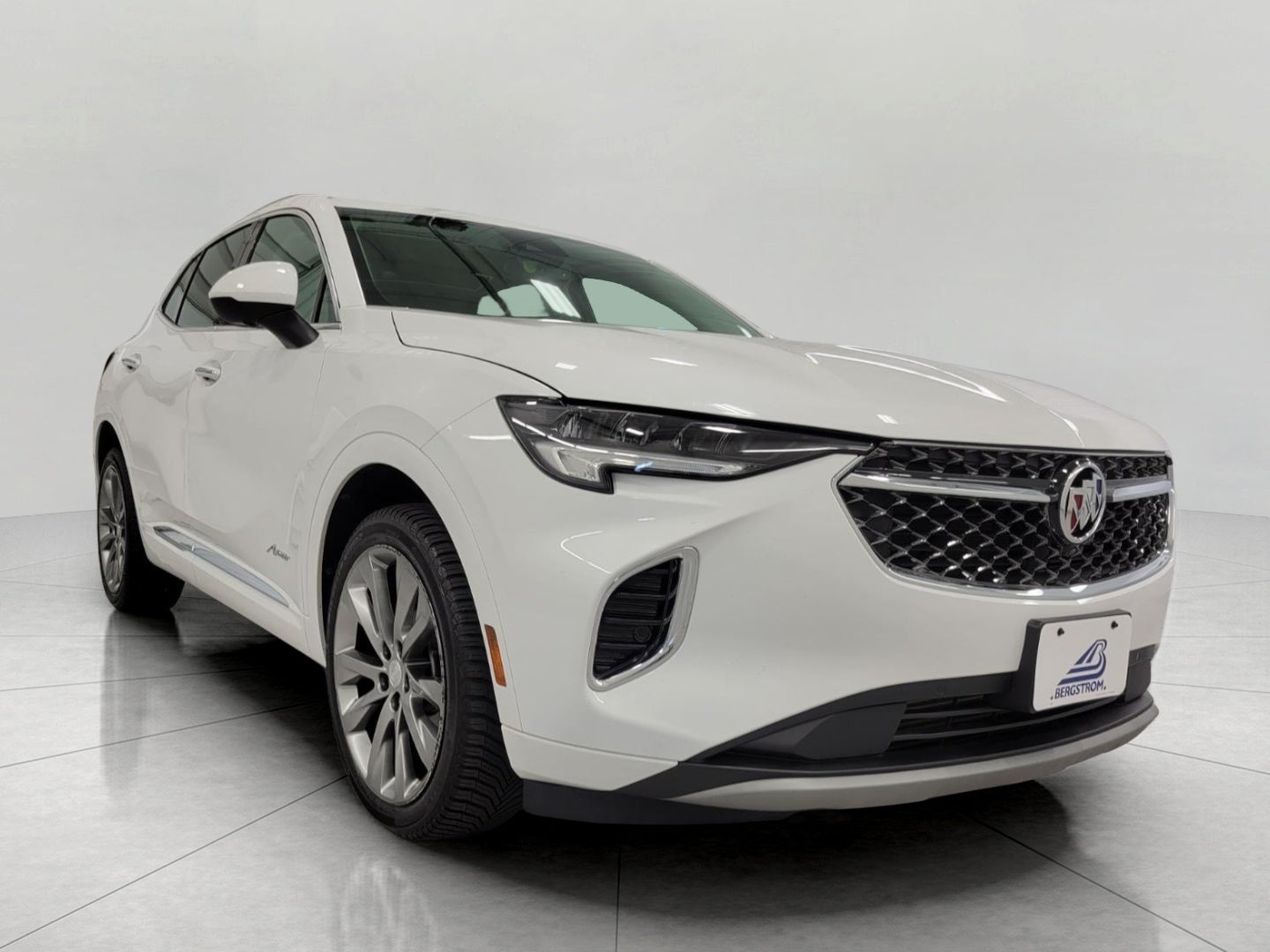 2021 Buick Envision AWD 4dr Avenir in Summit White — front three-quarter view